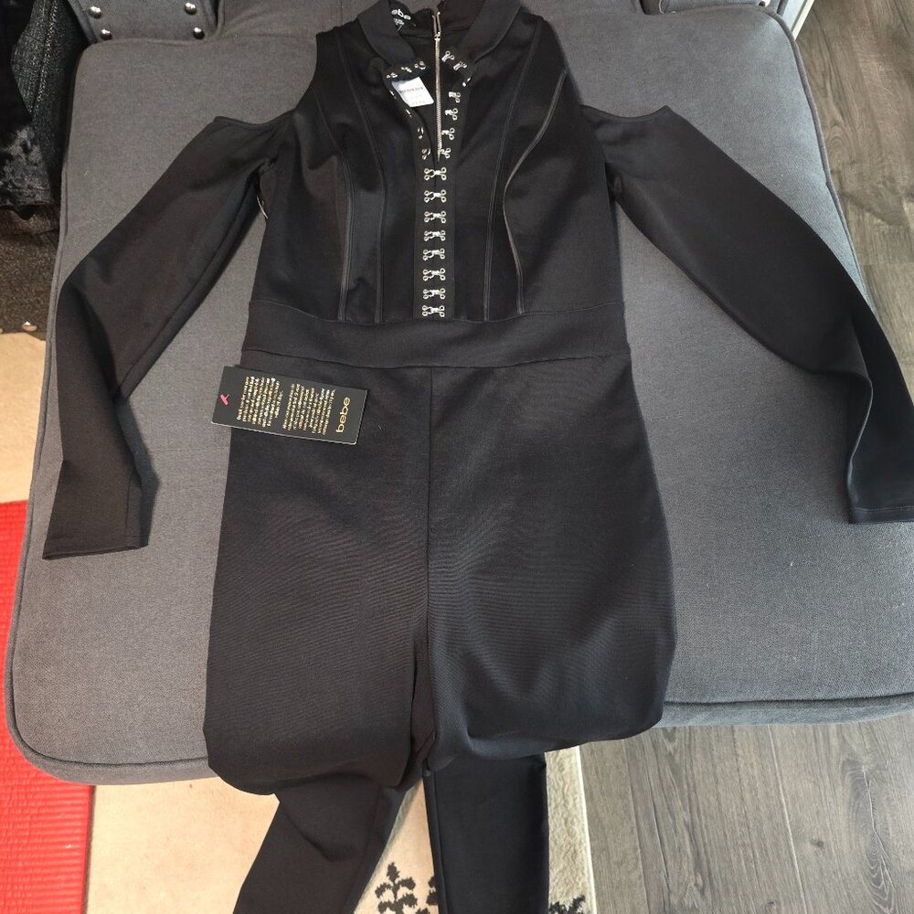Cold shoulder brand new bebe jumpsuit